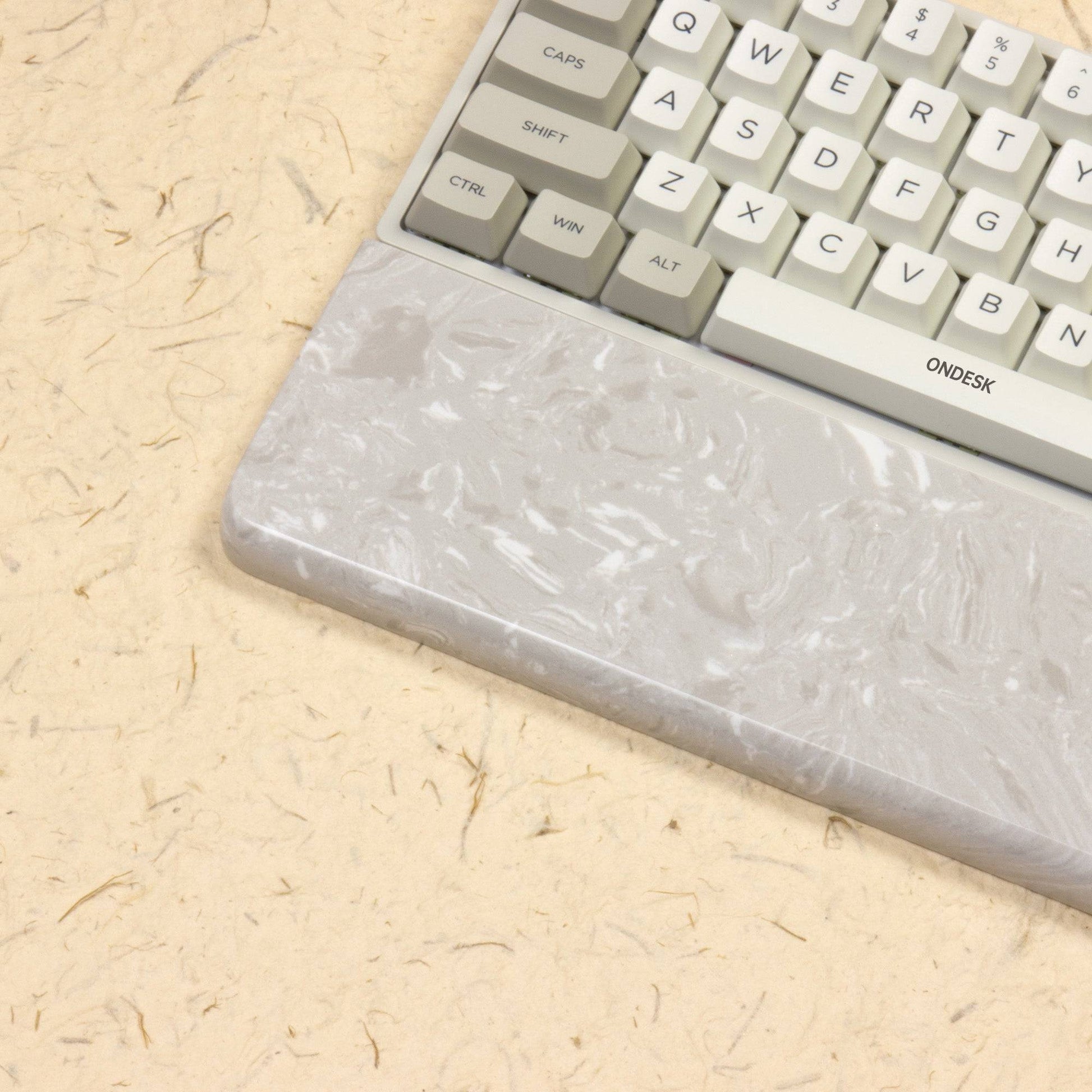 gray wrist rest with keyboard