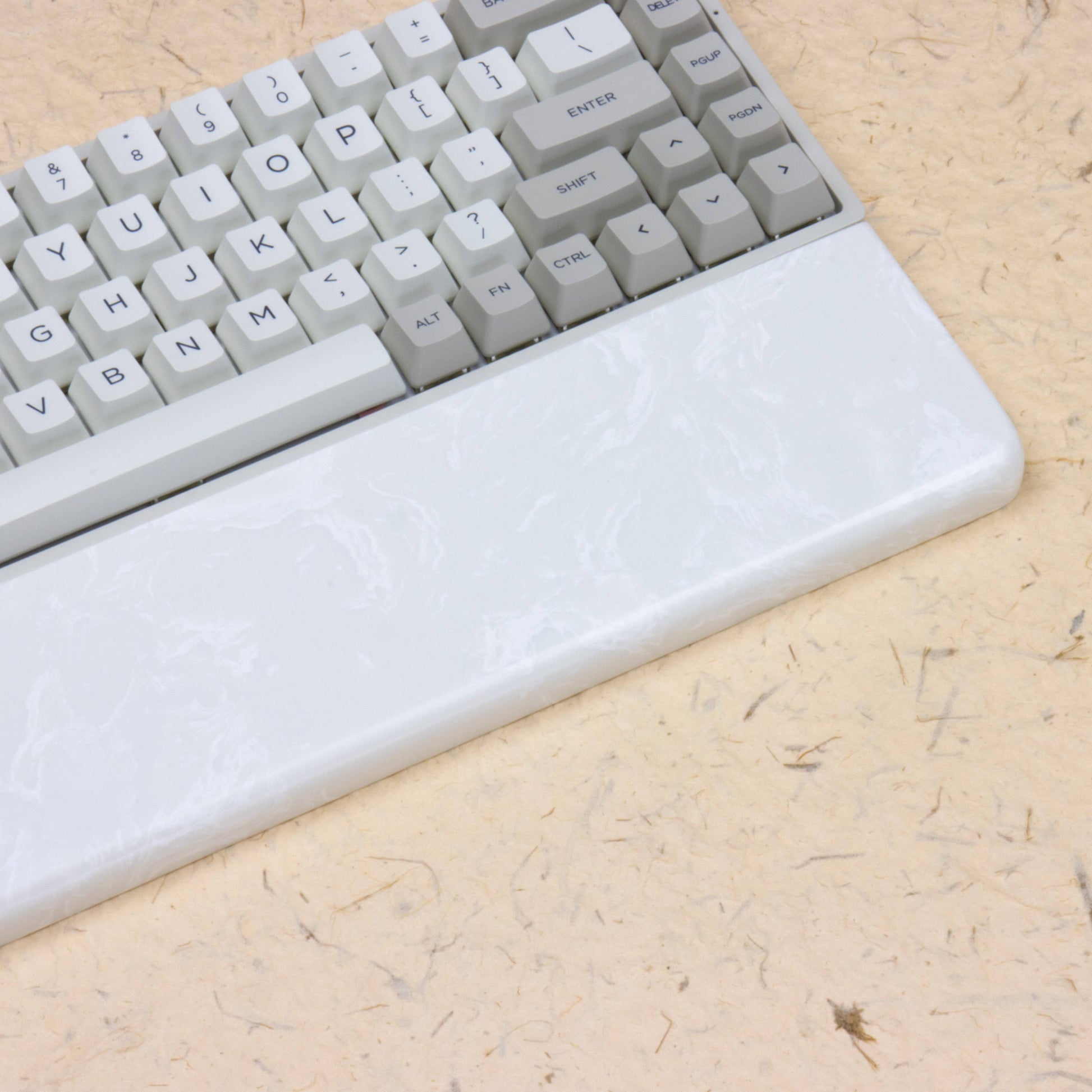 white and snow wrist rest with keyboard
