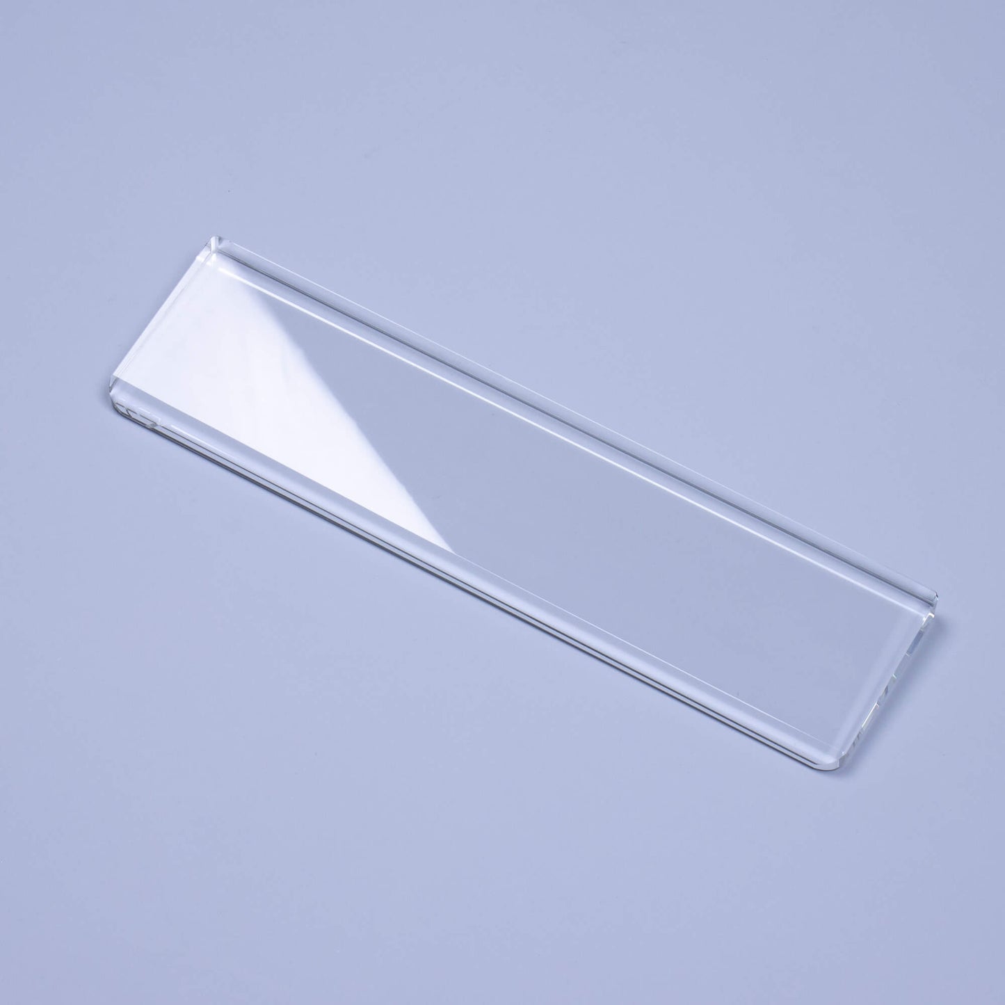 Clear Crystal Wrist Rest Blue background left reflective