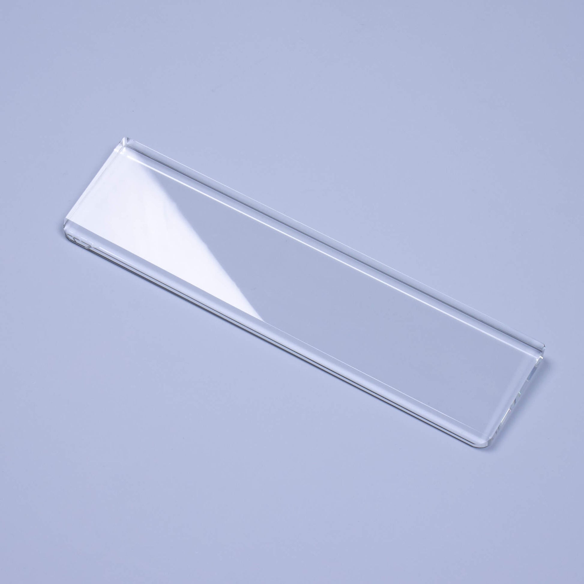 Clear Crystal Wrist Rest Blue background left reflective