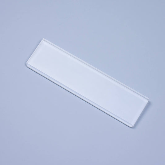 Frosted Crystal Wrist Rest overhead light on blue background