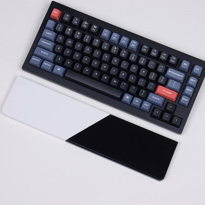Angled desk setup view of yeswristrest Pure Dual-Tone quartz wrist rest beside mechanical keyboard