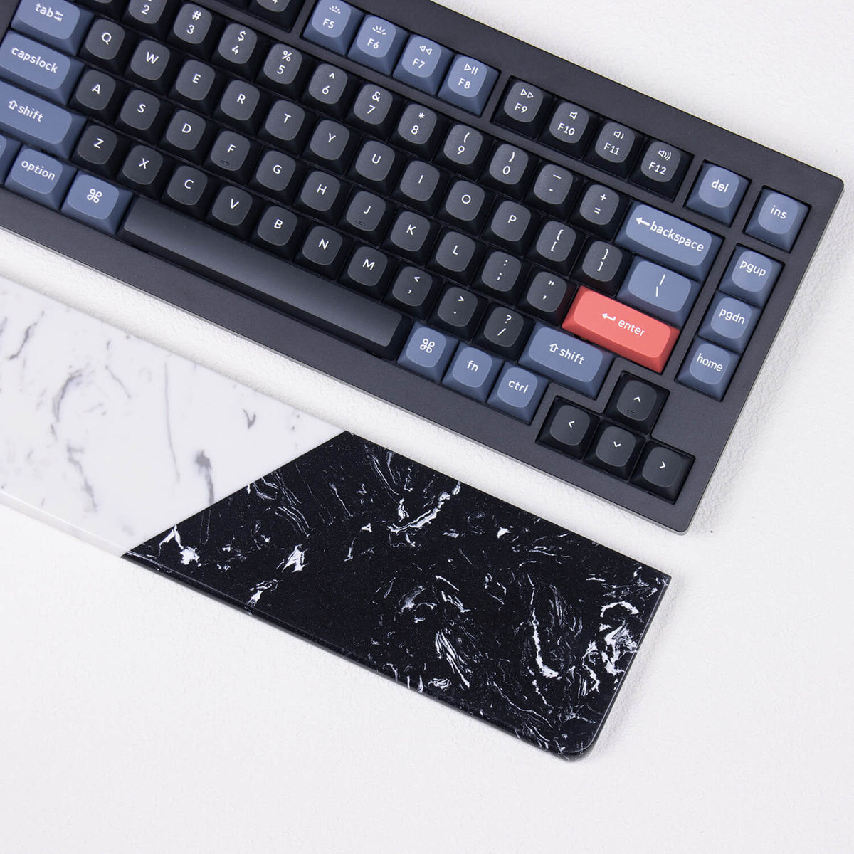 Close-up angle showing high-contrast crystalline texture on black base of yeswristrest quartz wrist rest