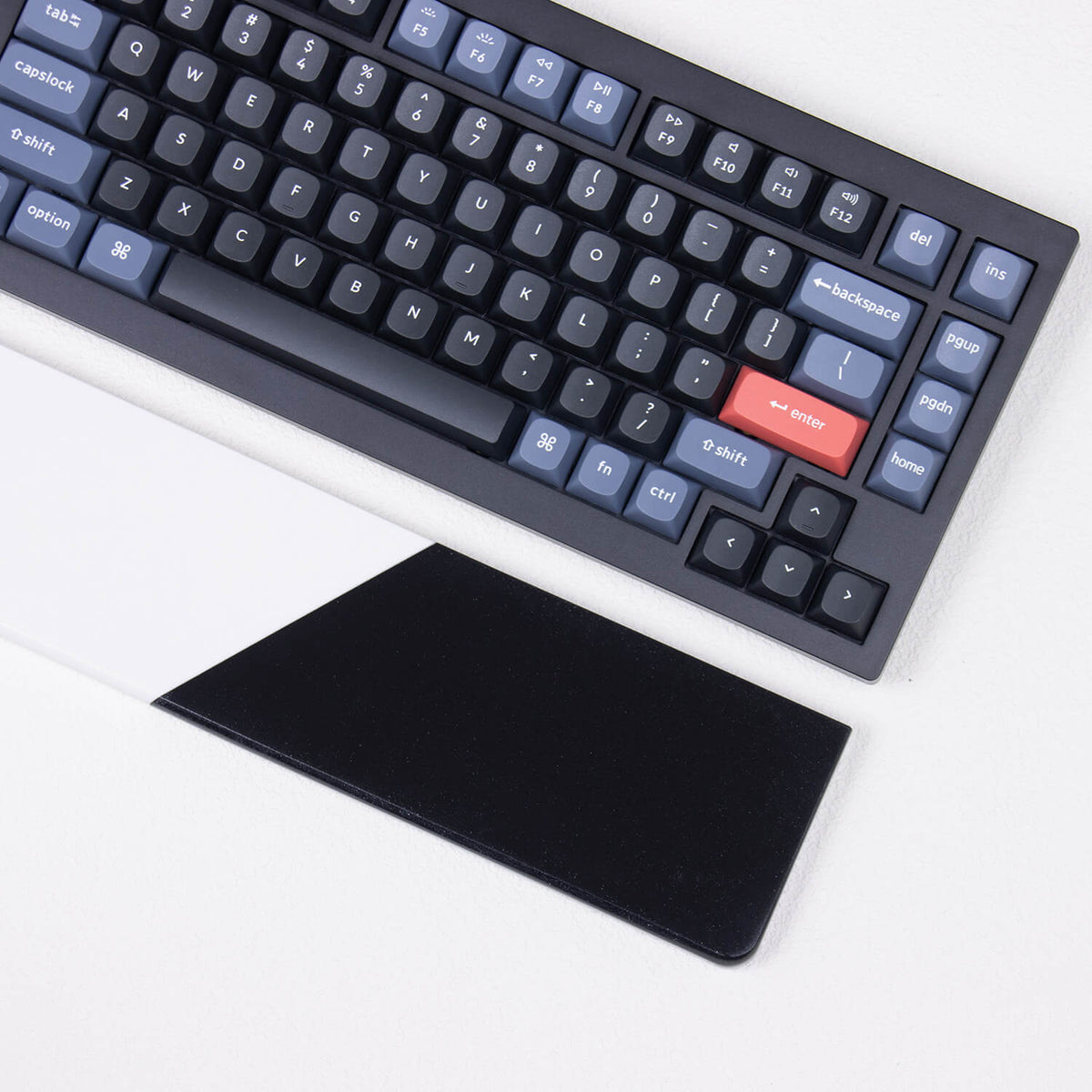 Close-up angle of smooth polished solid black and white diagonal split on Pure Dual-Tone quartz wrist rest