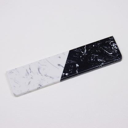 Full isolated perspective view of Textured Dual-Tone quartz wrist rest highlighting crystalline black and white patterns