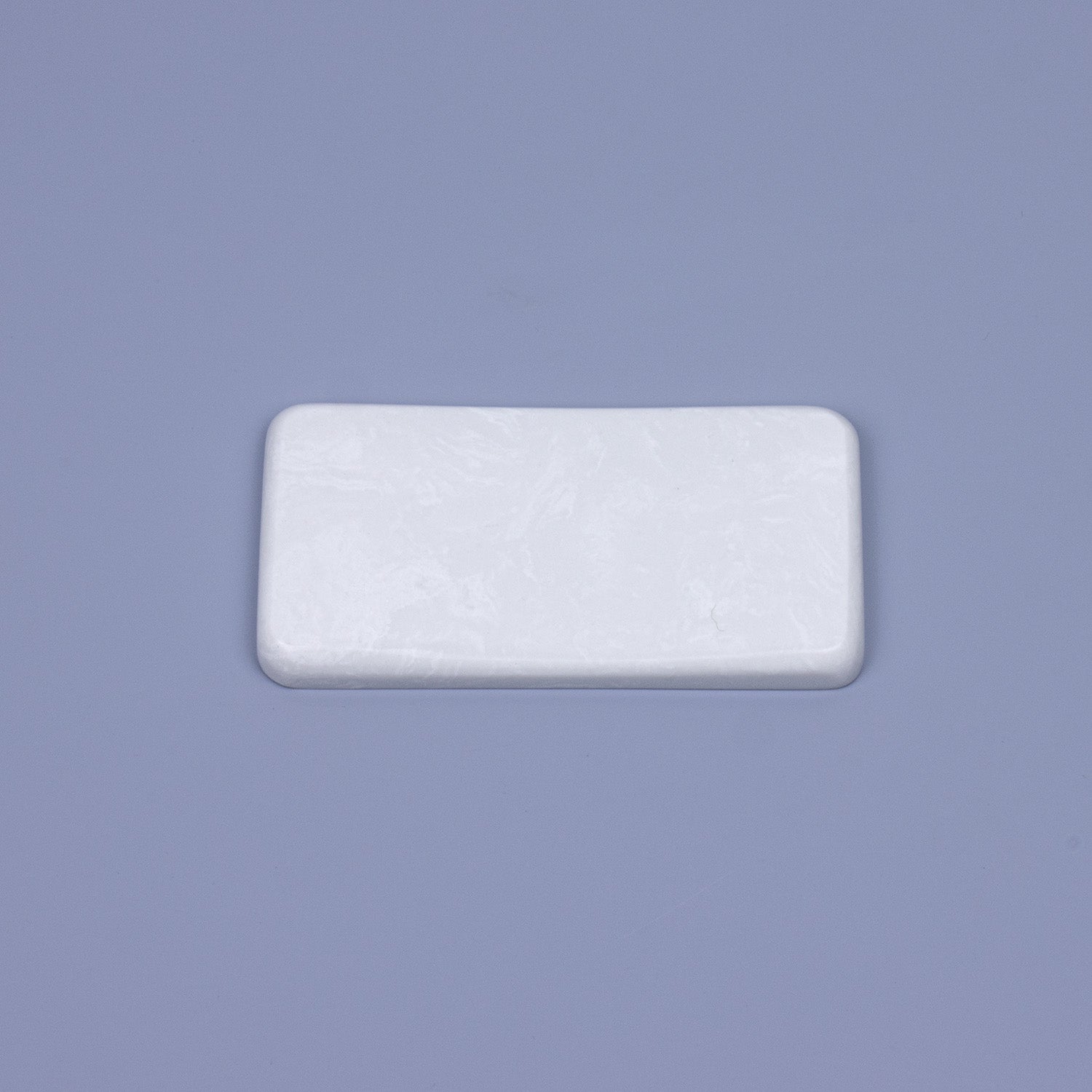Polished white snow quartz stone mouse wrist rest with subtle cloudy textures